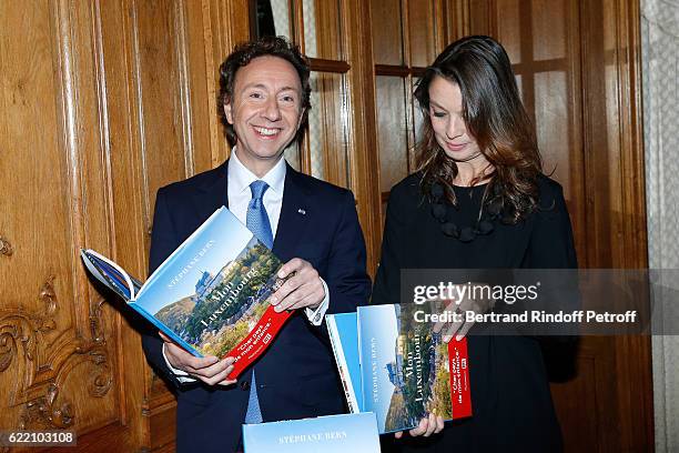 Stephane Bern and Isabelle Faber attend Stephane Bern signs his Book "Mon Luxembourg" at Residence of the Ambassador of Luxembourg on November 9,...
