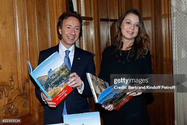 Stephane Bern and Isabelle Faber attend Stephane Bern signs his Book "Mon Luxembourg" at Residence of the Ambassador of Luxembourg on November 9,...