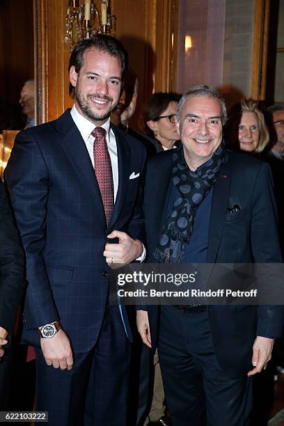 Prince Felix de Luxembourg and French Academician Dominique Perrault attend Stephane Bern signs his Book "Mon Luxembourg" at Residence of the...