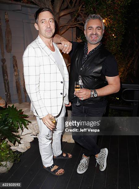 Gregory Parkinson and designer Martyn Lawrence attend the Urban Zen LA Opening on November 9, 2016 in Los Angeles, California.
