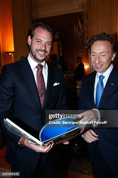 Prince Felix de Luxembourg and Stephane Bern attend Stephane Bern signs his Book "Mon Luxembourg" at Residence of the Ambassador of Luxembourg on...