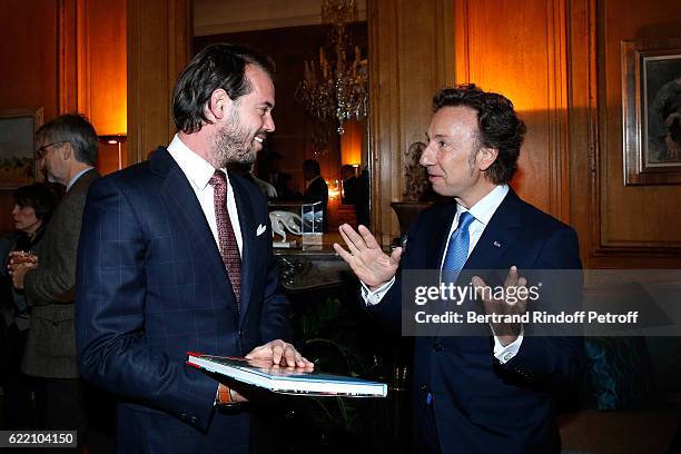 Prince Felix de Luxembourg and Stephane Bern attend Stephane Bern signs his Book "Mon Luxembourg" at Residence of the Ambassador of Luxembourg on...