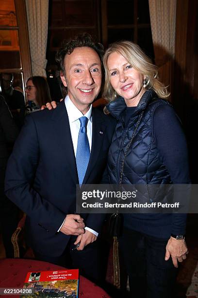 Stephane Bern and journalist Marine Jacquemin attend Stephane Bern signs his Book "Mon Luxembourg" at Residence of the Ambassador of Luxembourg on...