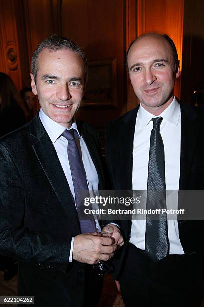 Writer Franck Ferrand and President of Editions Flammarion, Gilles Haeri attend Stephane Bern signs his Book "Mon Luxembourg" at Residence of the...