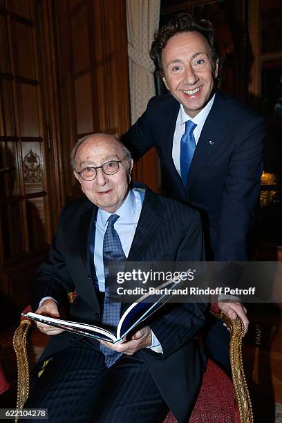 Stephane Bern and his father Louis Bern attend Stephane Bern signs his Book "Mon Luxembourg" at Residence of the Ambassador of Luxembourg on November...