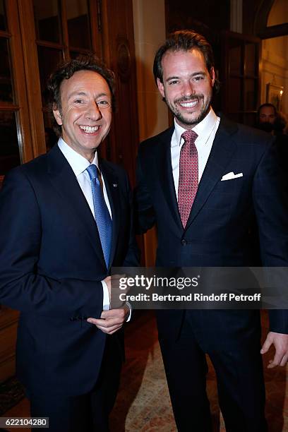 Stephane Bern and Prince Felix de Luxembourg attend Stephane Bern signs his Book "Mon Luxembourg" at Residence of the Ambassador of Luxembourg on...