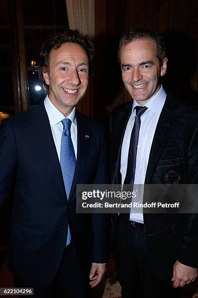 Stephane Bern and writer Franck Ferrand attend Stephane Bern signs his Book "Mon Luxembourg" at Residence of the Ambassador of Luxembourg on November...
