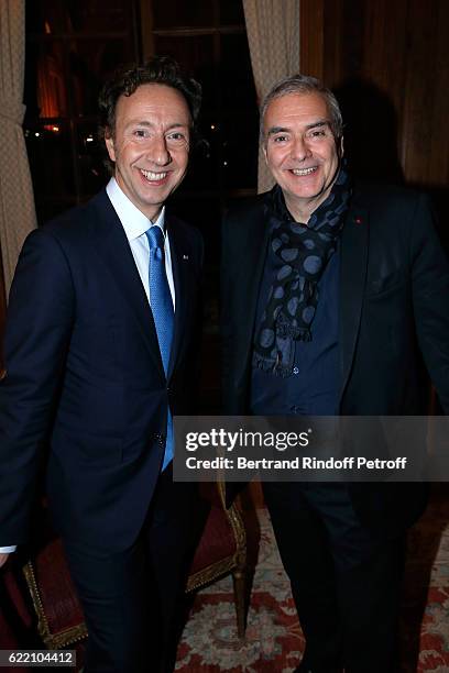 Stephane Bern and French Academician Dominique Perrault attend Stephane Bern signs his Book "Mon Luxembourg" at Residence of the Ambassador of...