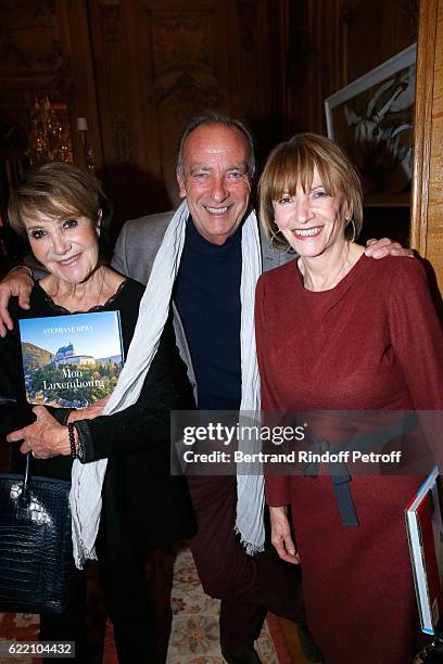 Eve Ruggieri, humorist Yves Lecoq and Yaguel Didier attend Stephane Bern signs his Book "Mon Luxembourg" at Residence of the Ambassador of Luxembourg...