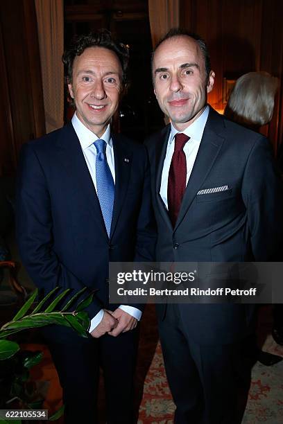 Stephane Bern and Ambassador of Albania to France, Dritan Tola attend Stephane Bern signs his Book "Mon Luxembourg" at Residence of the Ambassador of...