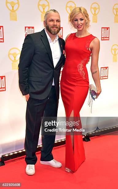 Sidney Hoffmann and Leonie Hagmeyer attend the 'Goldenes Lenkrad' Award at Axel Springer Haus on November 8, 2016 in Berlin, Germany.