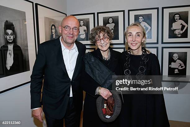 Curator of the Exghibition, Fabrice Hergott, Model Sarah Moon and Carla Sozzani attend the Carla Sozzani : Photo Exhibition at Azzedine Alaia Gallery...