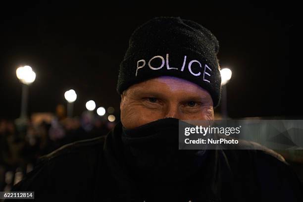 Policeman during a protest. Between 200 and 300 police members, firefighters took part to a march to ask for more consideration, more means for...