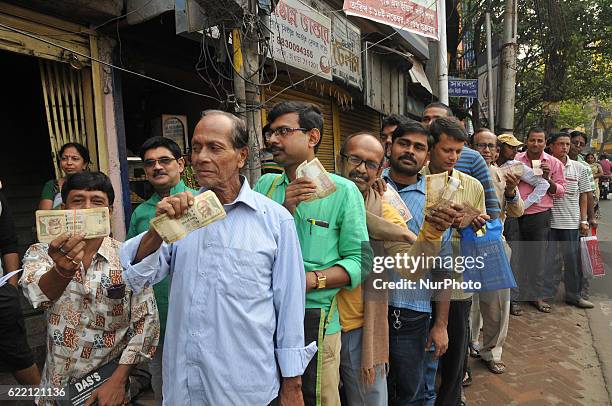 Indian long time waiting a long line at Front of STATE BANK OF