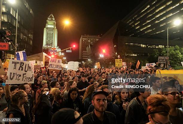 Demonstrators gather to protest a day after President-elect Donald Trump's victory, at a rally outside Los Angeles City Hall in Los Angeles,...