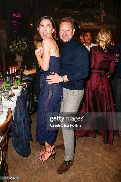 German actress Nadine Warmuth and Bastian Ammelounx, CEO La Martina Germany attend the La Martina x GQ Pre-Dinner on November 9, 2016 in Berlin,...