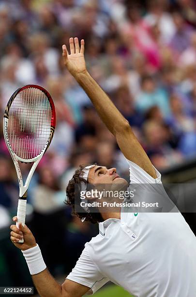 Roger Federer of Switzerland in action during his Gentlemen's Singles semi final match against Novak Djokovic of Serbia on day eleven of the...