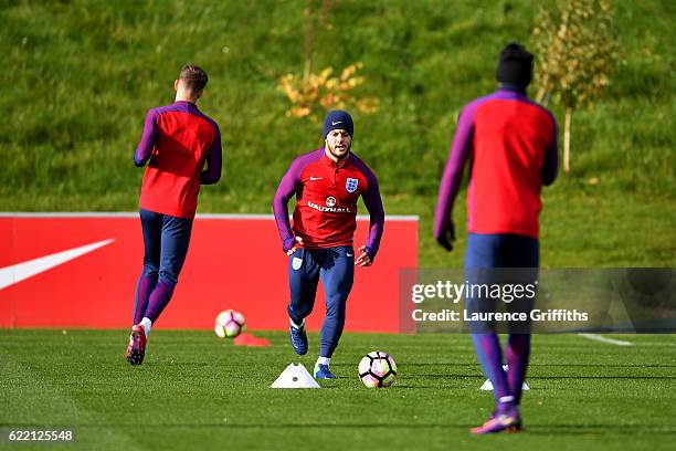 Jack Wilshere of England runs during a training session ahead of the FIFA 2018 World Cup qualifying group F match against Scotland at St George's...