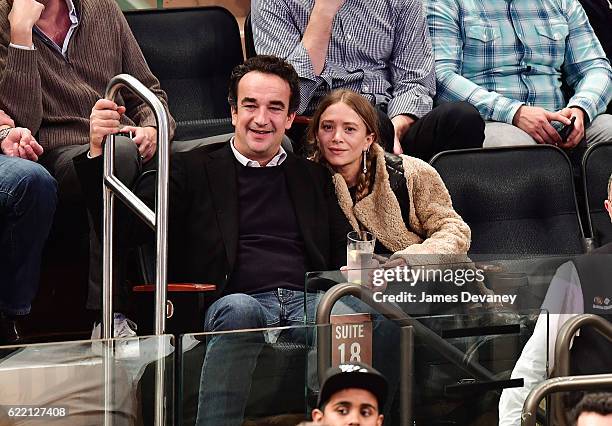 Olivier Sarkozy and Mary-Kate Olsen attend New York Knicks vs Brooklyn Nets game at Madison Square Garden on November 9, 2016 in New York City.