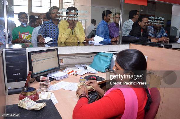 People in a queue at post office to exchange their 500 and 1000 currency in Allahabad.