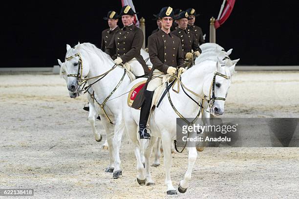 Horse riders from the Spanish Riding School of Vienna perform during their 450th Anniversary tour in London, United Kingdom on November 10, 2016. The...