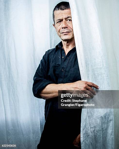 Writer Emmanuel Carrere is photographed for Madame Figaro on June 17, 2014 in Paris, France. PUBLISHED IMAGE. CREDIT MUST READ: Stephane...