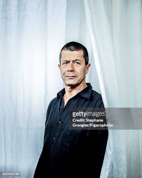 Writer Emmanuel Carrere is photographed for Madame Figaro on June 17, 2014 in Paris, France. CREDIT MUST READ: Stephane Grangier/Figarophoto/Contour...