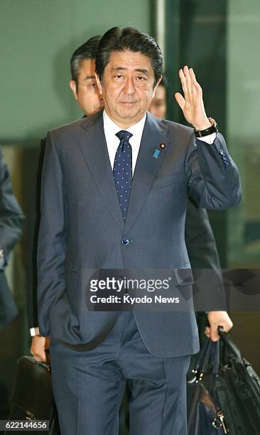 Japanese Prime Minister Shinzo Abe arrives at his office in Tokyo on Nov. 10, 2016. Abe spoke with Donald Trump on the phone, and the U.S....