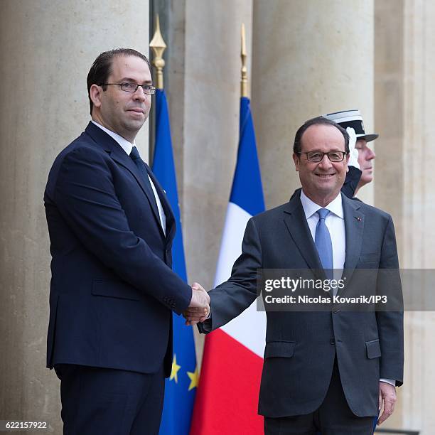 French President Francois Hollande receives Tunisian Prime Minister Youssef Chahed for a meeting at the Elysee Palace on November 10, 2016 in Paris,...