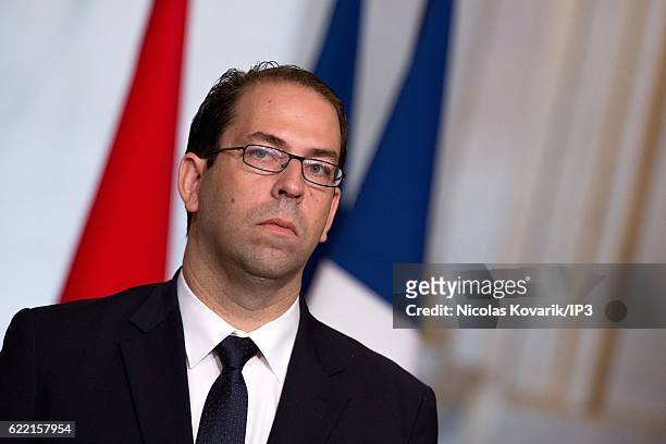 Tunisian Prime Minister Youssef Chahed, received by French President Francois Hollande , delivers a speech at the Elysee Palace on November 10, 2016...
