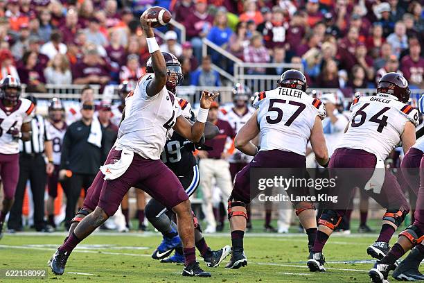 Jerod Evans of the Virginia Tech Hokies drops back to pass against the Duke Blue Devils at Wallace Wade Stadium on November 5, 2016 in Durham, North...
