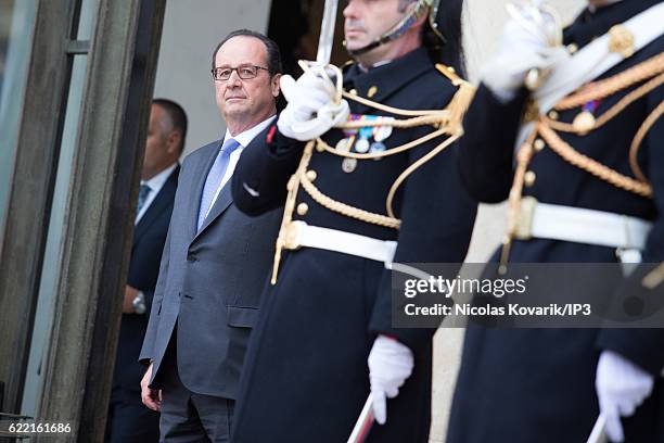 French President Francois Hollande awaits the arrival of Tunisian Prime Minister Youssef Chahed for a meeting at the Elysee Palace on November 10,...