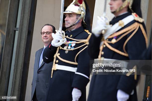 French President Francois Hollande awaits the arrival of Tunisian Prime Minister Youssef Chahed for a meeting at the Elysee Palace on November 10,...