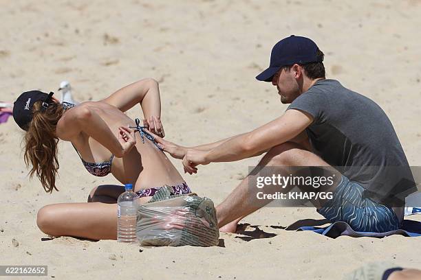 Demi Harman pictured with partner Alec Snow enjoying a beach outing on October 15, 2016 in Sydney, Australia.