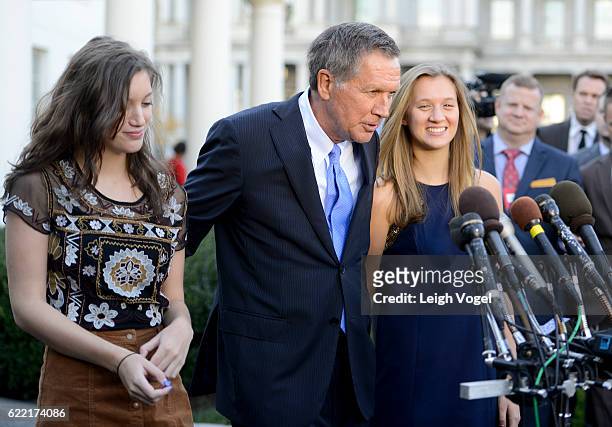 Ohio Governor John Kasich introduces his daughters, Emma and Reese, to media after President Obama welcomed the 2016 NBA Champions Cleveland...