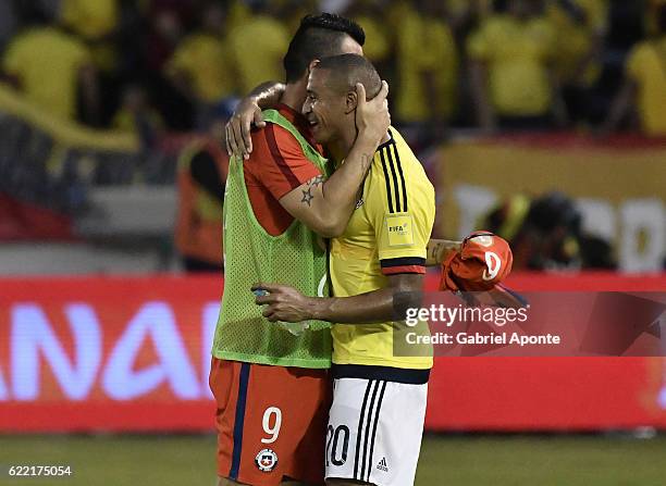 Macnelly Torres of Colombia greets Esteban Paredes of Chile after a match between Colombia and Chile as part of FIFA 2018 World Cup Qualifiers at...