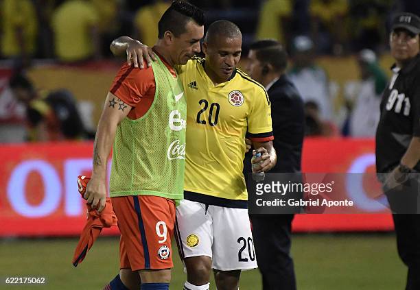 Macnelly Torres of Colombia greets Esteban Paredes of Chile after a match between Colombia and Chile as part of FIFA 2018 World Cup Qualifiers at...