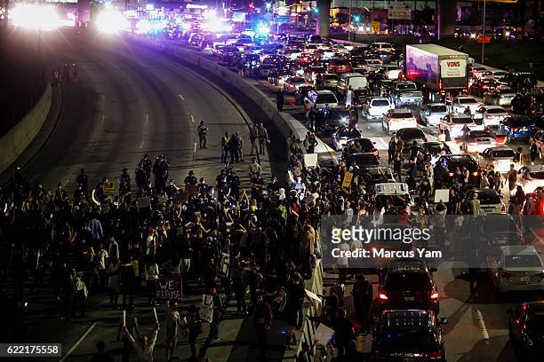 Anti-Trump protesters flood the 101 freeway as they protest the President-Elect Donald Trump in Los Angeles, Calif., on Nov. 10, 2016.