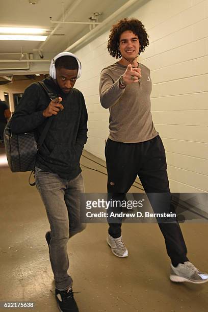 Anderson Varejao and Damian Jones of the Golden State Warriors arrive prior to a game against the New Orleans Pelicans at Smoothie King Center on...