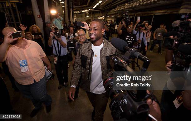 Media surrounds Dwyane Wade of the Chicago Bulls as he enters American Airlines Arena before the game against the Miami Heat on November 10, 2016 in...