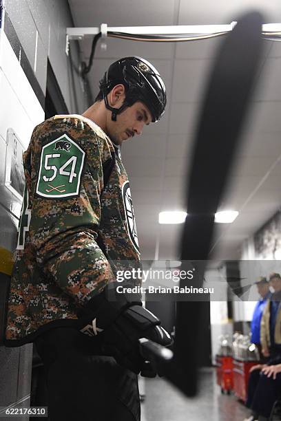 Adam McQuaid of the Boston Bruins wears his camo warm up jersey before Military Appreciation Night against the Columbus Blue Jackets at the TD Garden...