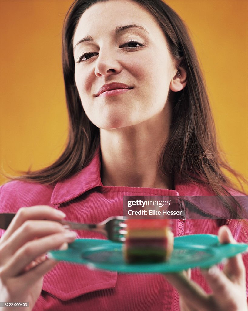 Woman Eating Cake