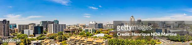 sandton city panorama in the daytime - sandton johannesburg stock pictures, royalty-free photos & images
