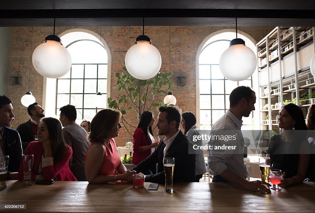 Couple having drinks at a bar