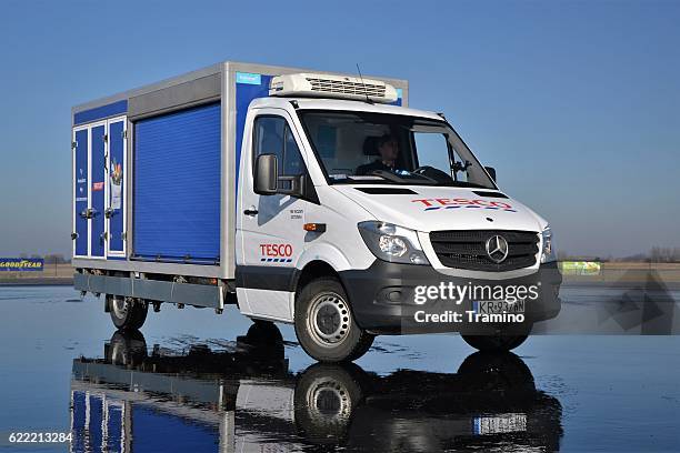 tesco delivery van - corporate car fleet stock pictures, royalty-free photos & images