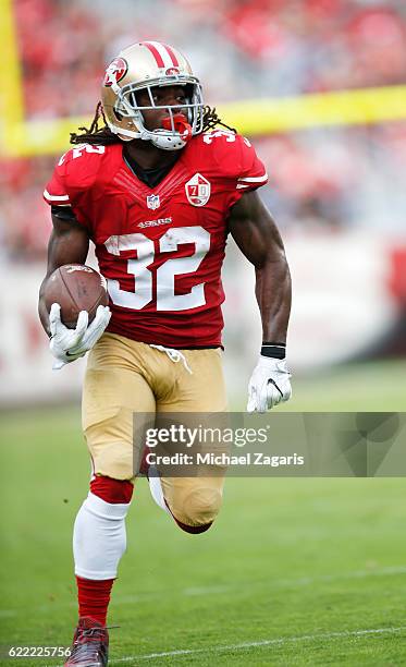 DuJuan Harris of the San Francisco 49ers heads to the end zone on a 47-yard touchdown pass during the game against the New Orleans Saints at Levi...