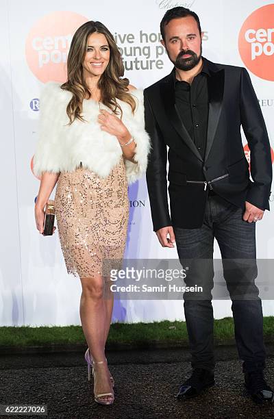 Elizabeth Hurley and Evgeny Lebedev attend Centrepoint At The Palace at Kensington Palace on November 10, 2016 in London, England.