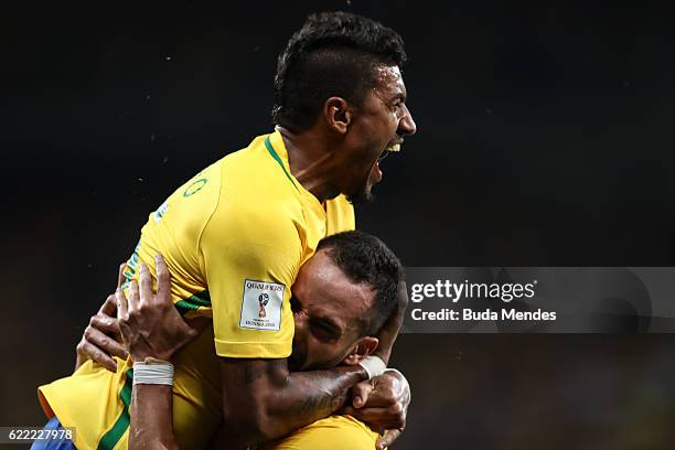 Paulinho and Renato Augusto of Brazil celebrate a scored goal during a match between Brazil and Argentina as part of 2018 FIFA World Cup Russia...