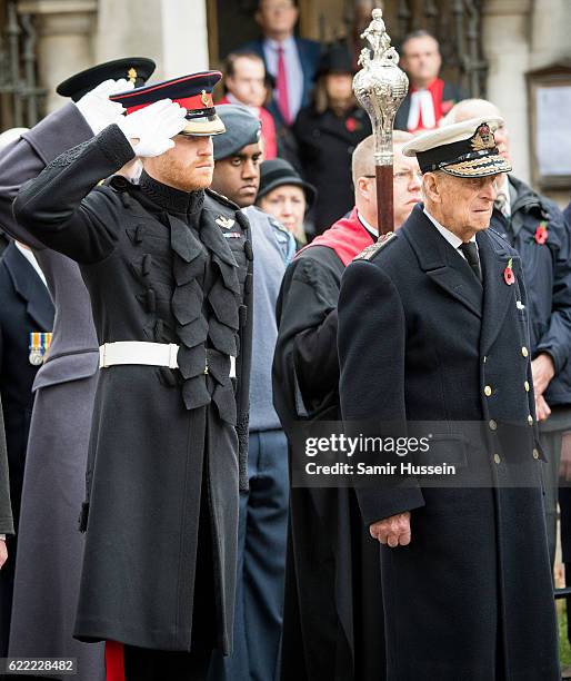 Prince Philip, Duke of Edinburgh and Prince Harry visit the Fields of Remembrance at Westminster Abbey on November 10, 2016 in London, England.