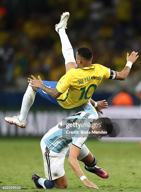 Neymar of Brazil struggles for the ball with Ramiro Funes of Argentina during a match between Brazil and Argentina as part of 2018 FIFA World Cup...